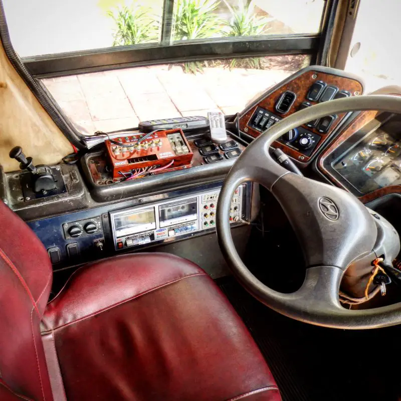 Retro-looking bus with cool controls and a cassette player.