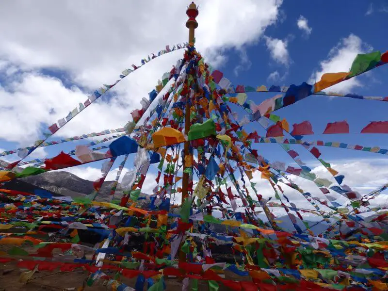 Lots of colourful prayer flags. Highway to Deqin. Yunnan, China.