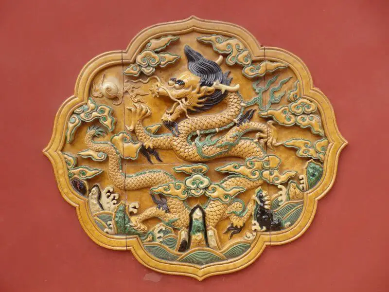 Wall sculptures at the Forbidden City, Beijing, China.