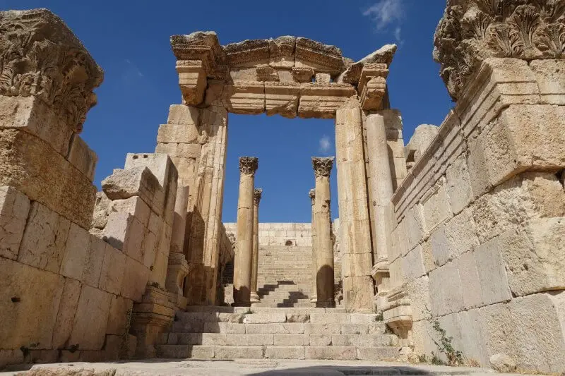One of the doorways beside the Nymphaeum leading up the hill behind. Jerash, Jordan.