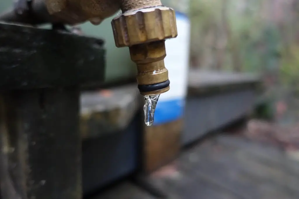 Frozen tap at Bert Nichols Hut, Overland Track, Tasmania.