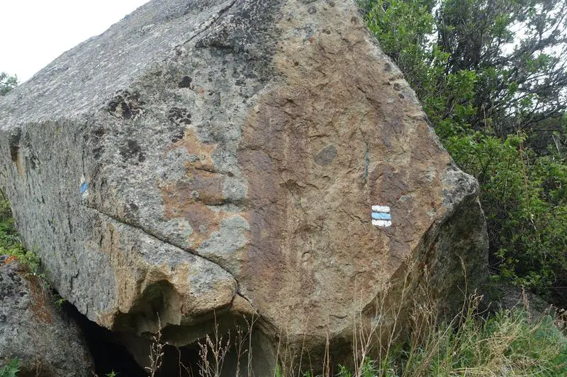 Look out for paint marks such as the one on this rock. Ak Sai Waterfall Trail, Ala Archa National Park.