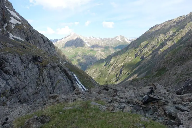 The same valley looking different at sunset, in the middle of the night, and now in the morning. Ala-Kul, Kyrgyzstan.